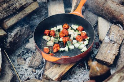 food cooking in pan over fire