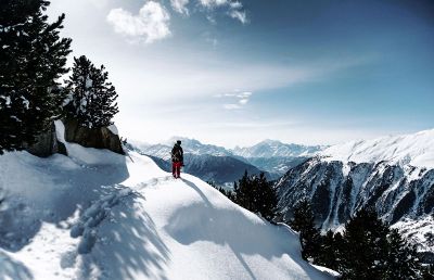 hiker standing on ridge