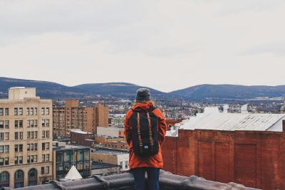 a woman overlooking the city