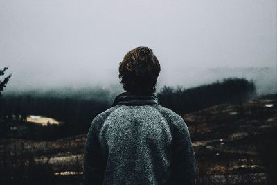 person looking into clouds