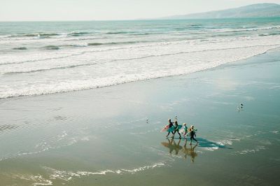 kids playing on a beach