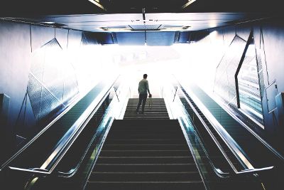 man on stairs looking up