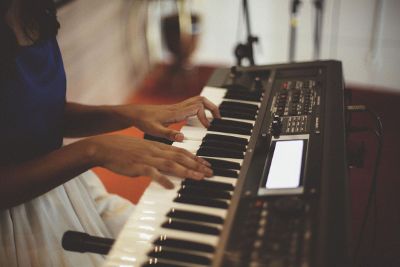 person playing keyboard