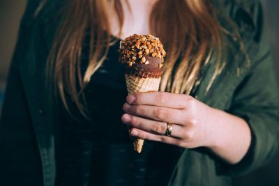 holding chocolate ice cream