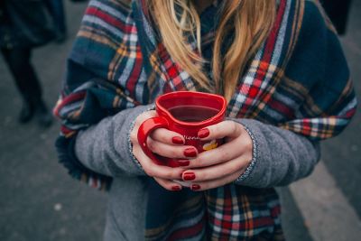 girl holding mug