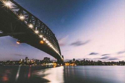 lit bridge at sunset