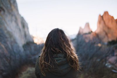 girl admiring mountain range