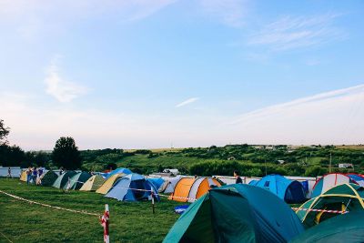blue sky over tents