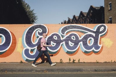 man walking in front of good