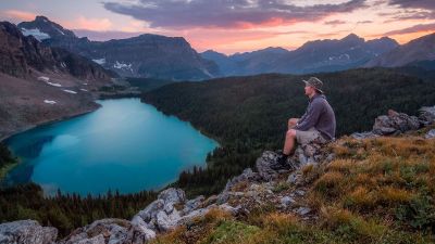 a man sitting by the valley