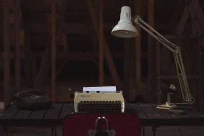 typewriter sitting on a desj