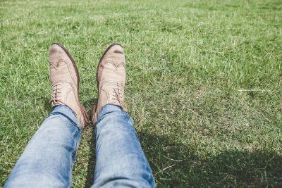 legs in the grass