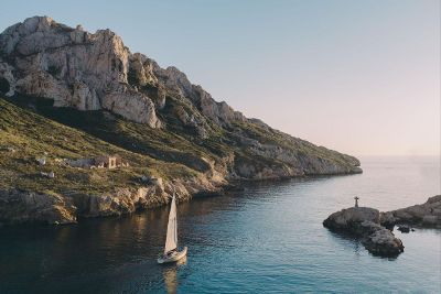 boat next to rocky beach