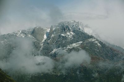 snow and clouds on mountain ranges