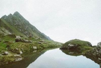 glassy pond on hill