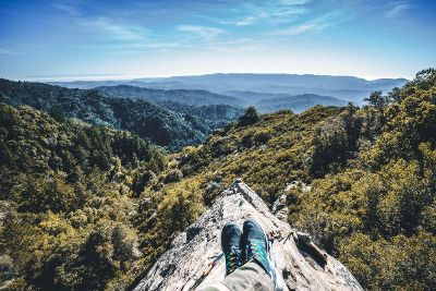 man sitting on a mountain