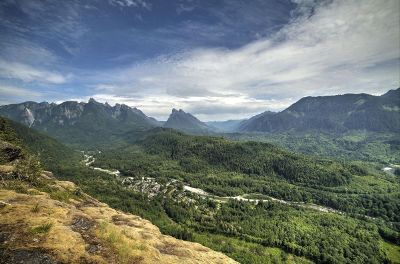 mountain range with clouds in sky