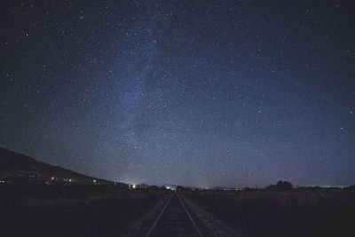 open sky above railroad tracks