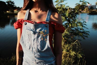 skinny girl in overalls