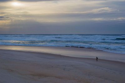 lonely man on a beach