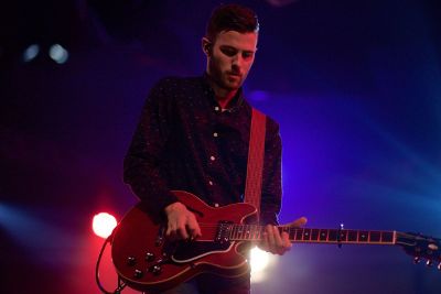 a man playing guitar