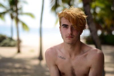 man on beach with hair