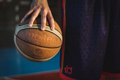 player holds basketball