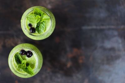 jars with berries and leaves