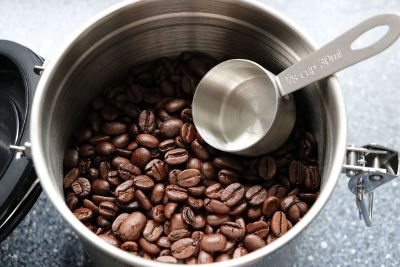coffee beans in silver container