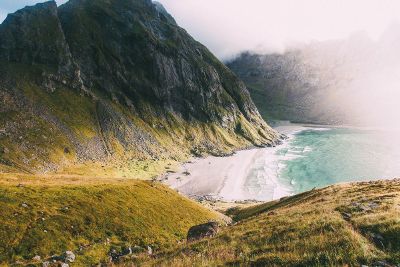 beach by mountains