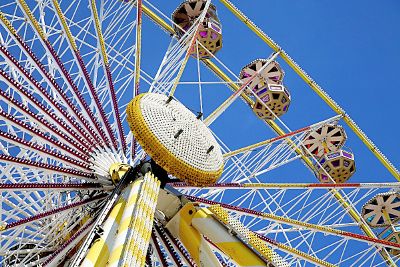 ferris wheel against blue sky