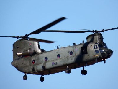 military helicopter in flight