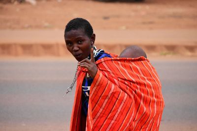 woman carrying child