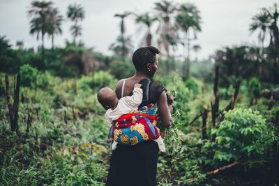 woman carrying baby