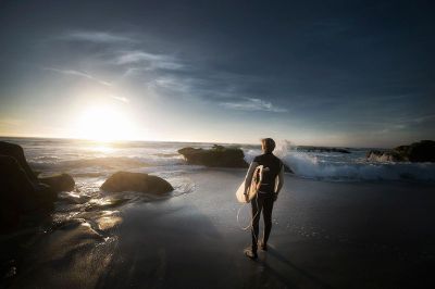 surfer contemplating paddling out