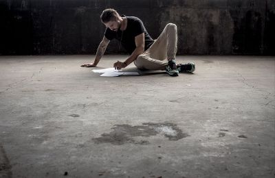 man painting on floor