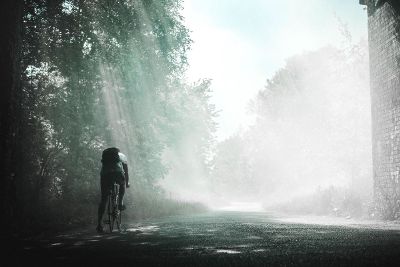 man riding his bike