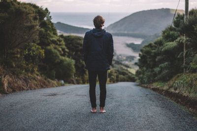 man viewing mountain on hill