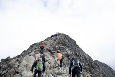 mountain climbers with backpacks
