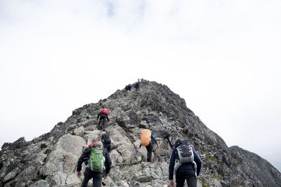 mountain climbers with backpacks