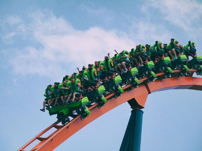 roller coaster descending a hill