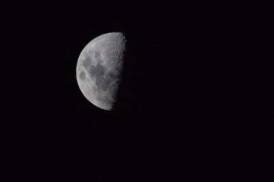 half moon in dark sky