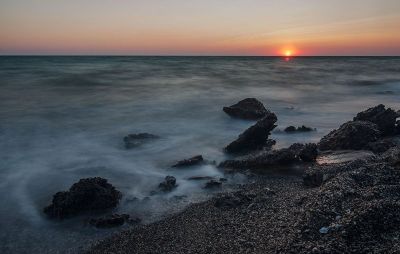 beach with sun going down