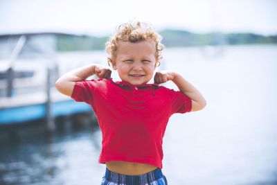 happy kid at dock