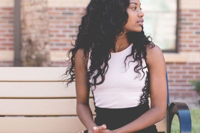 girl sitting on bench