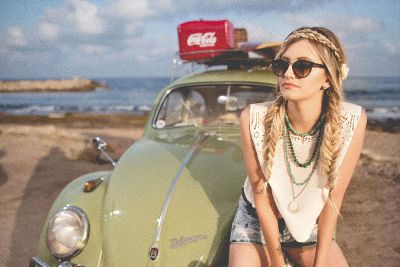hippy girl with vintage car
