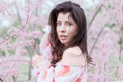 brunette with pink flowers