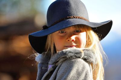 little girl with blue hat