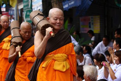 men carrying scrolls