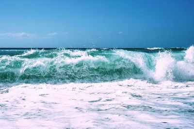 blue and white waves crashing